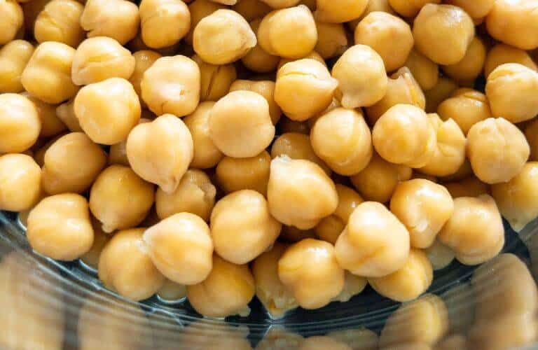 canned chickpeas in a clear bowl