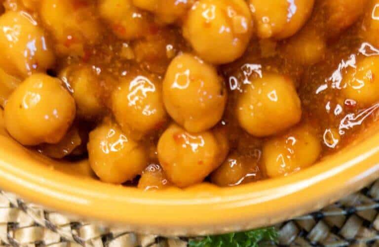 sweet and spicy thai chickpeas recipe in a yellow bowl