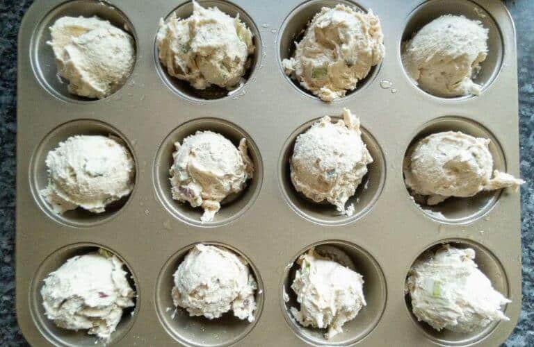 cupcake batter in Remy Olivier muffin tin ready for baking