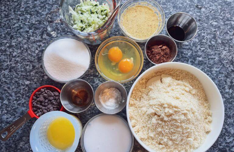 bowls of ingredients for chocolate zucchini cupcakes