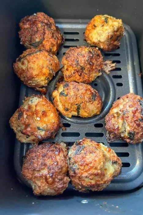gluten-free turkey curry meatballs in air fryer basket