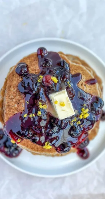 Transform your leftover sourdough discard into delightful gluten-free pancakes with a citrusy twist of lemon and bursts of blueberry!