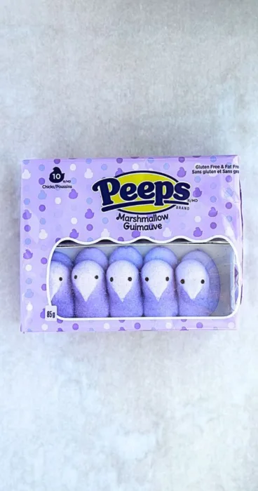 A delightful image of purple Peeps marshmallow candies, capturing the essence of a gluten-free baking endeavor made extraordinary with the use of microwaving.