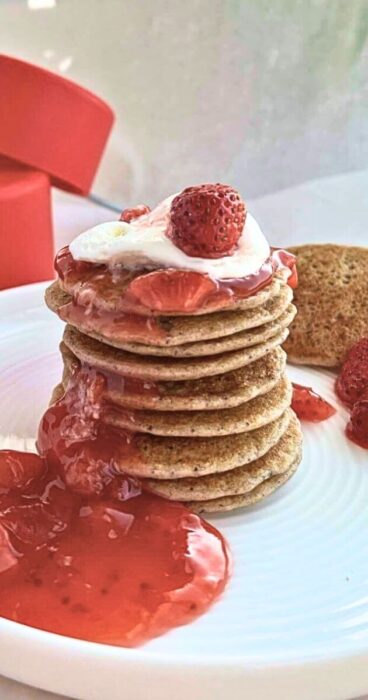 Gluten-free sourdough discard pancakes stacked on a plate