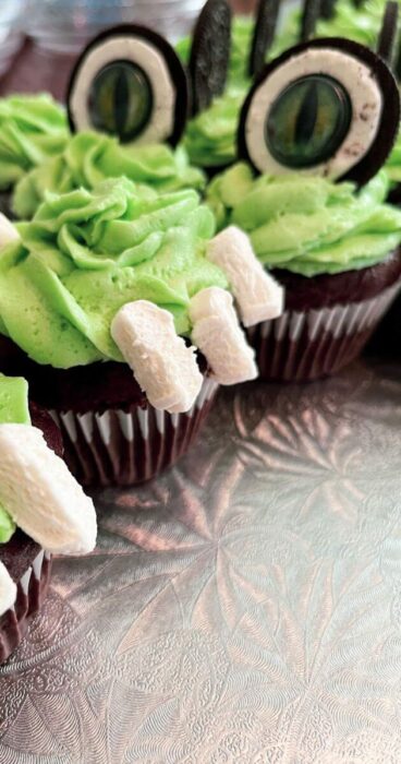A fun and tasty treat designed to look like a friendly alligator, perfect for celebrations.